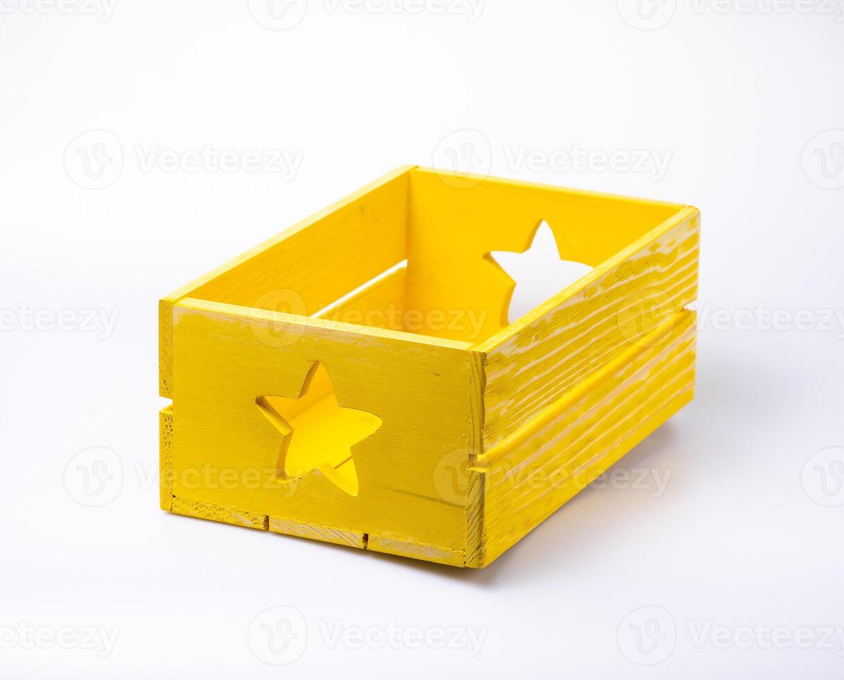Empty decorative wooden crate isolated on white photo
