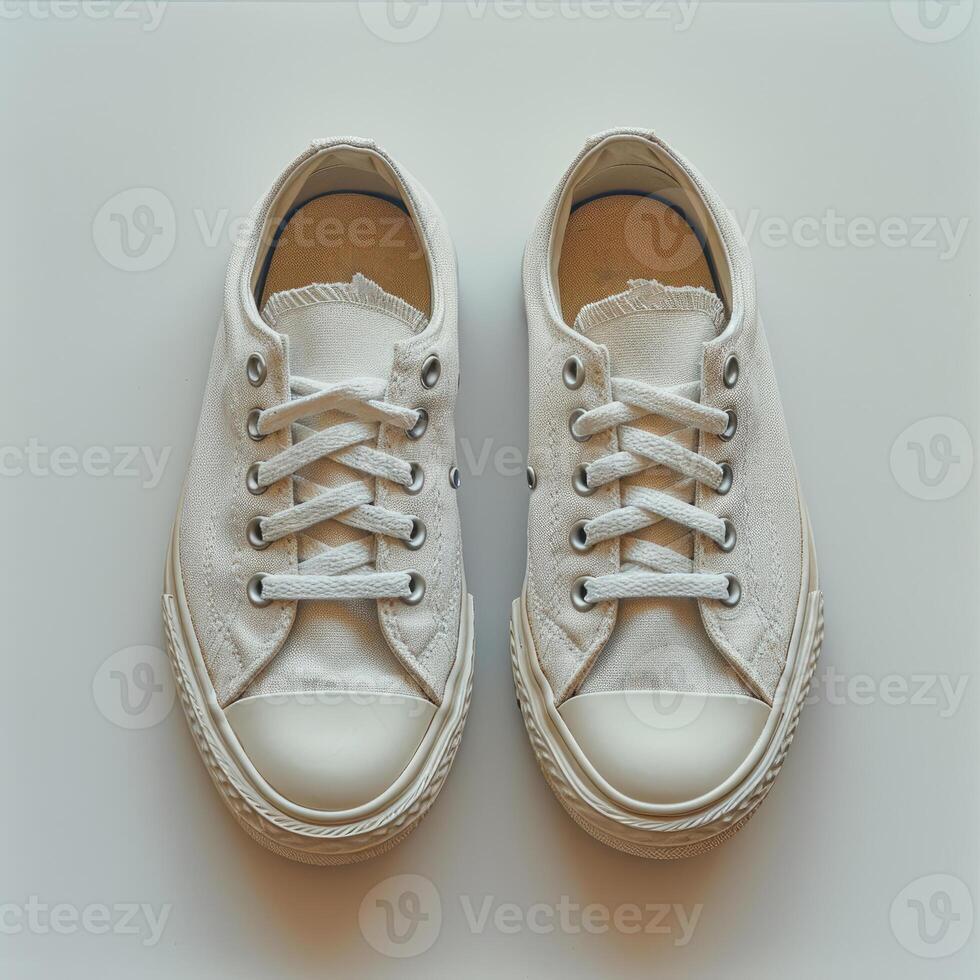 AI Generated White sneakers on white background photo