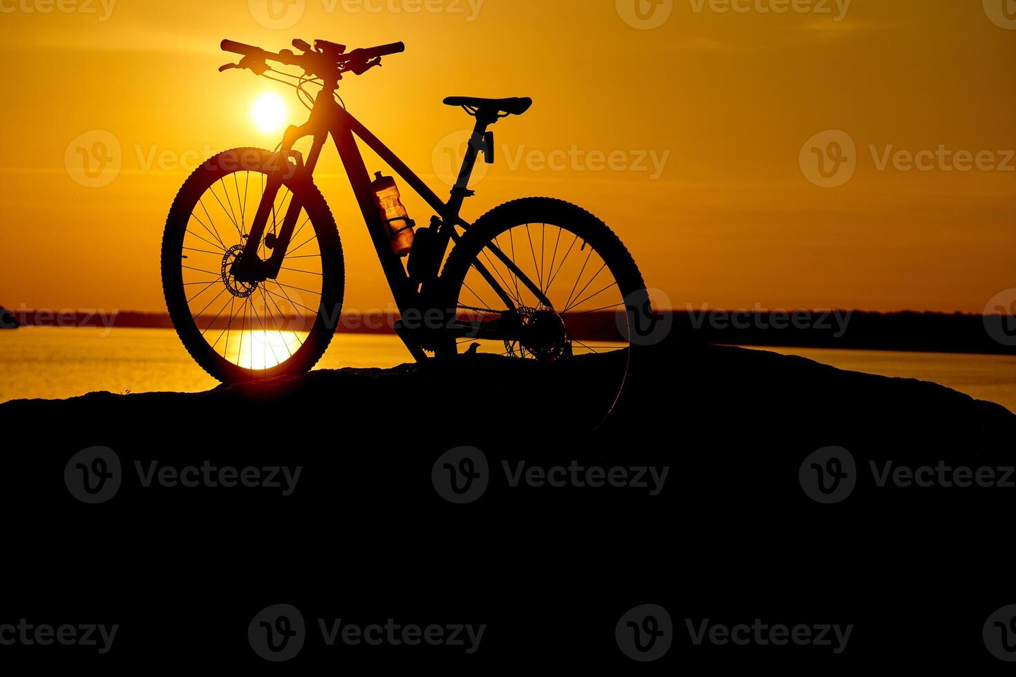 silhouette bike on sunrise. Active Lifestyle Concept photo