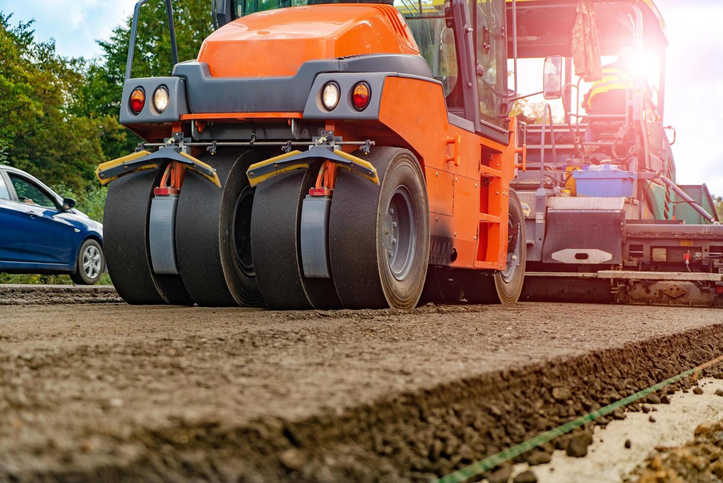 Heavy Vibration roller compactor at asphalt pavement works for road and highway construction photo