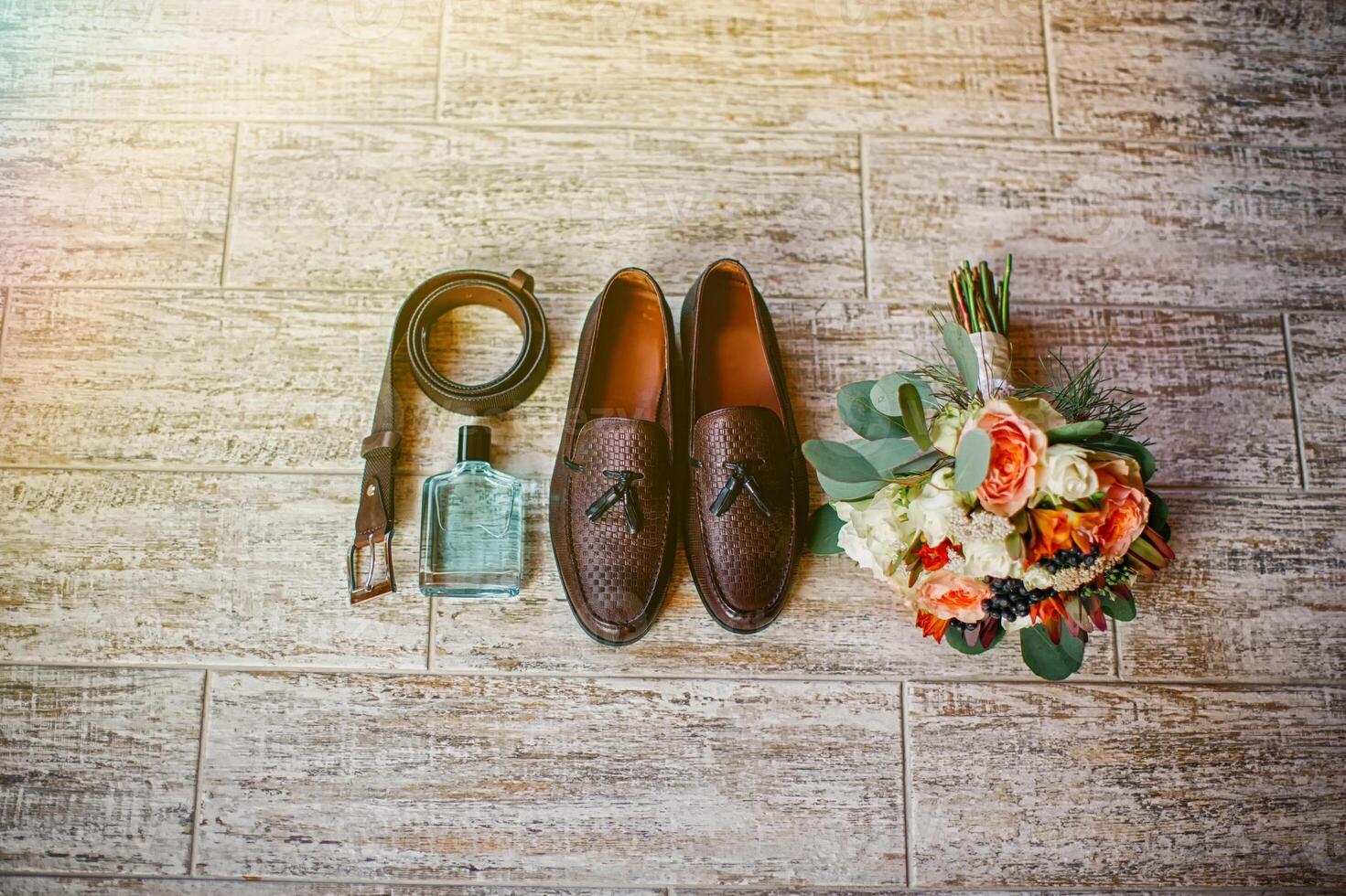 Wedding details. Accessories for the groom. Shoes, bouquet, belt, perfume photo