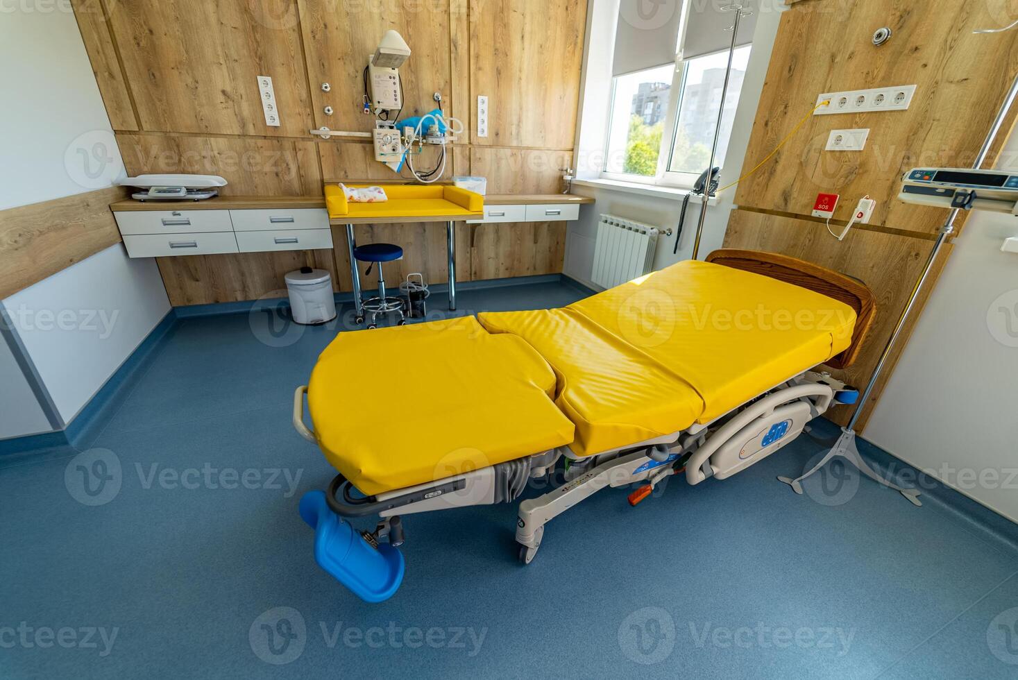 Empty patient beds in a maternity ward. Modern light ward of maternity hospital. photo