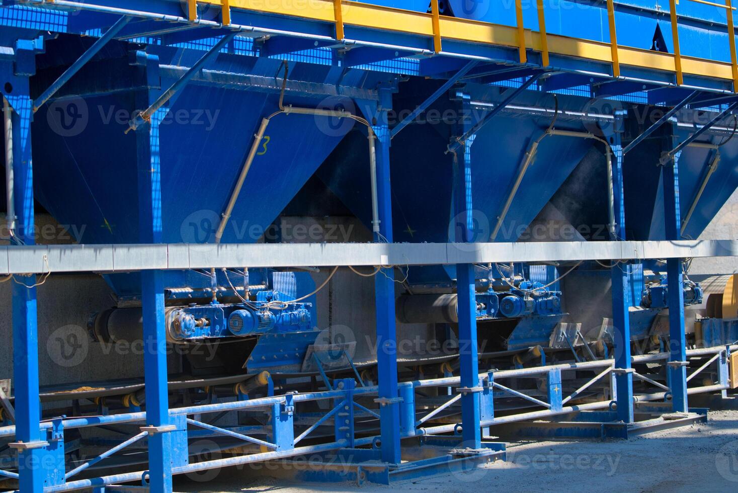 equipment for production of asphalt, cement and concrete. Asphalt factory. Tanks for concrete or rubble. Selective focus. photo