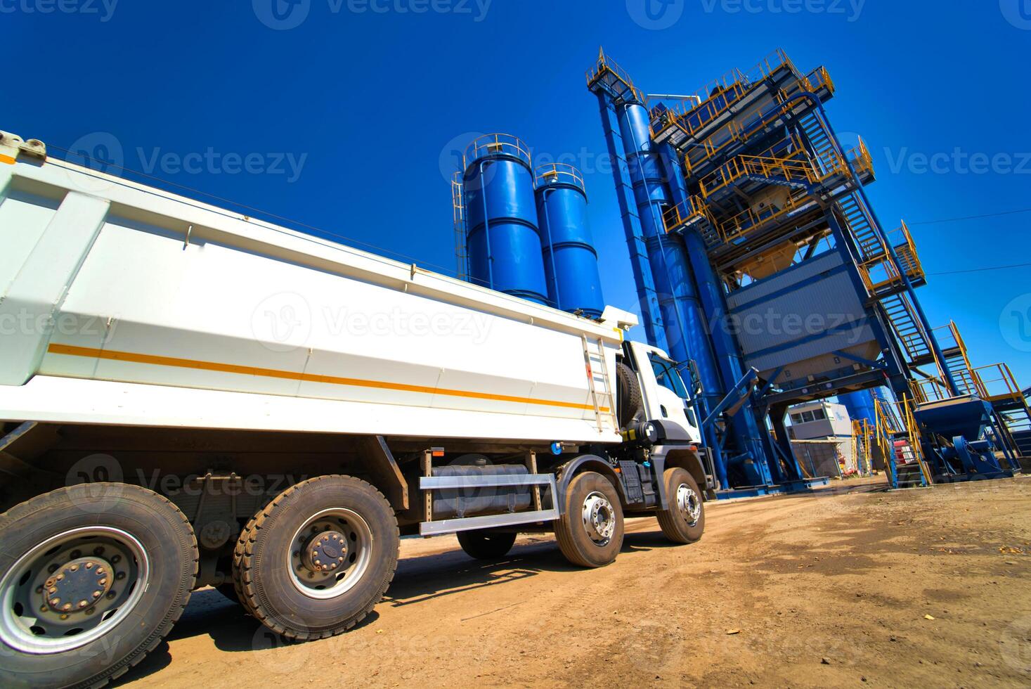 Gravel pit. Building and wheel loader ready to load gravel or sand onto a truck photo