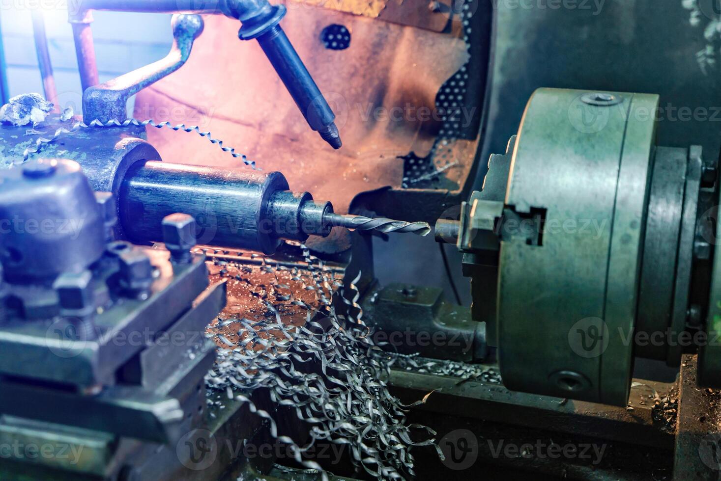 Horizontal shot of a lathe grinding machine indoors. Metalworking industry concept. Professional machinist. Copyspace photo