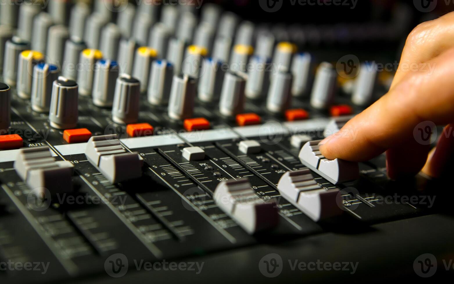 Hand on a mixer, operating the leader photo