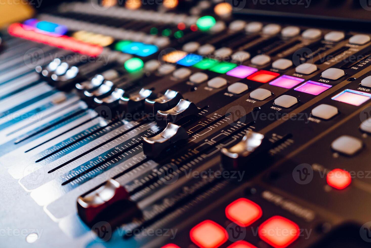 professional concert mixing console is equipped with high-precision and long-stroke faders. Close-up photo