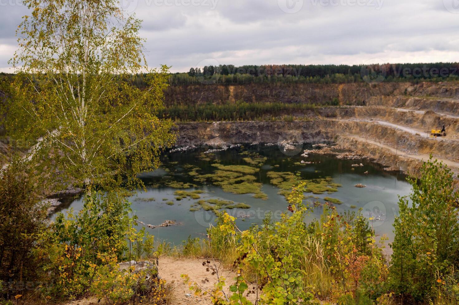 Old quarry which is converted into a public. Fake lake. Panoramic view. Nature. photo