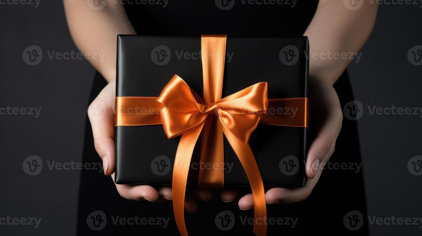 AI generated Woman's hands cradle a black gift box adorned with an orange bow on a dark background. Ai Generated photo