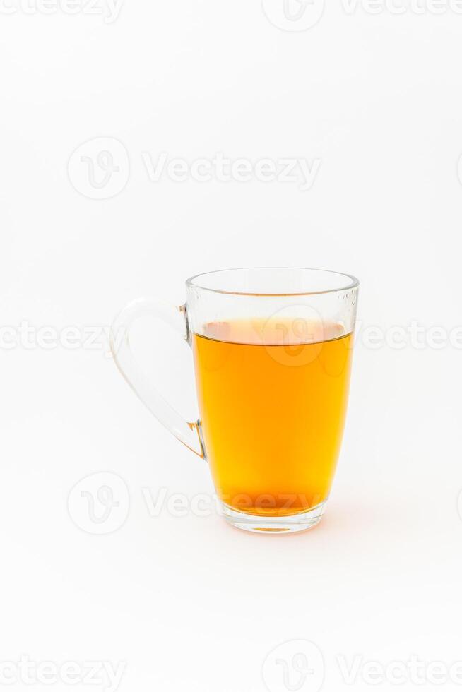 Glas tea mug on a white background photo
