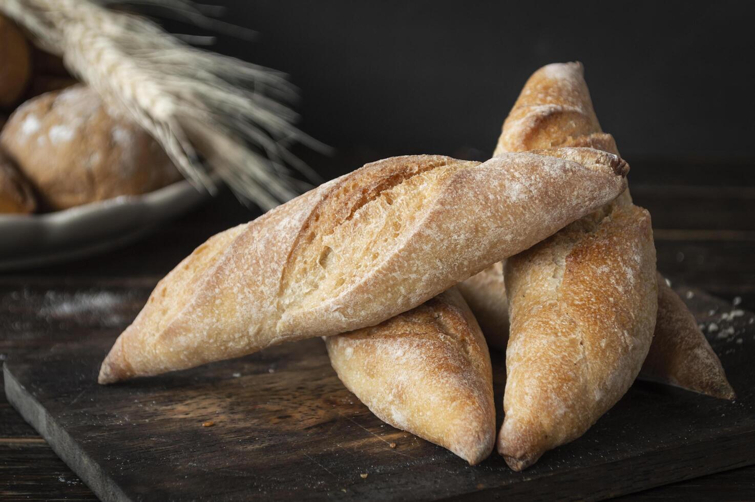 bread rolls on a wooden board photo