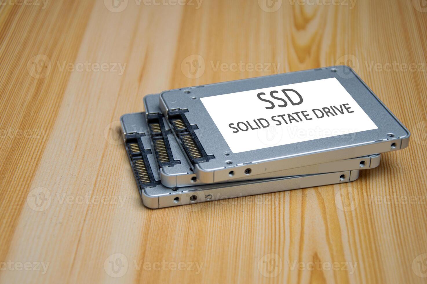 SSD disk drive placed on wooden surface, high speed SSD, SSD sata port photo
