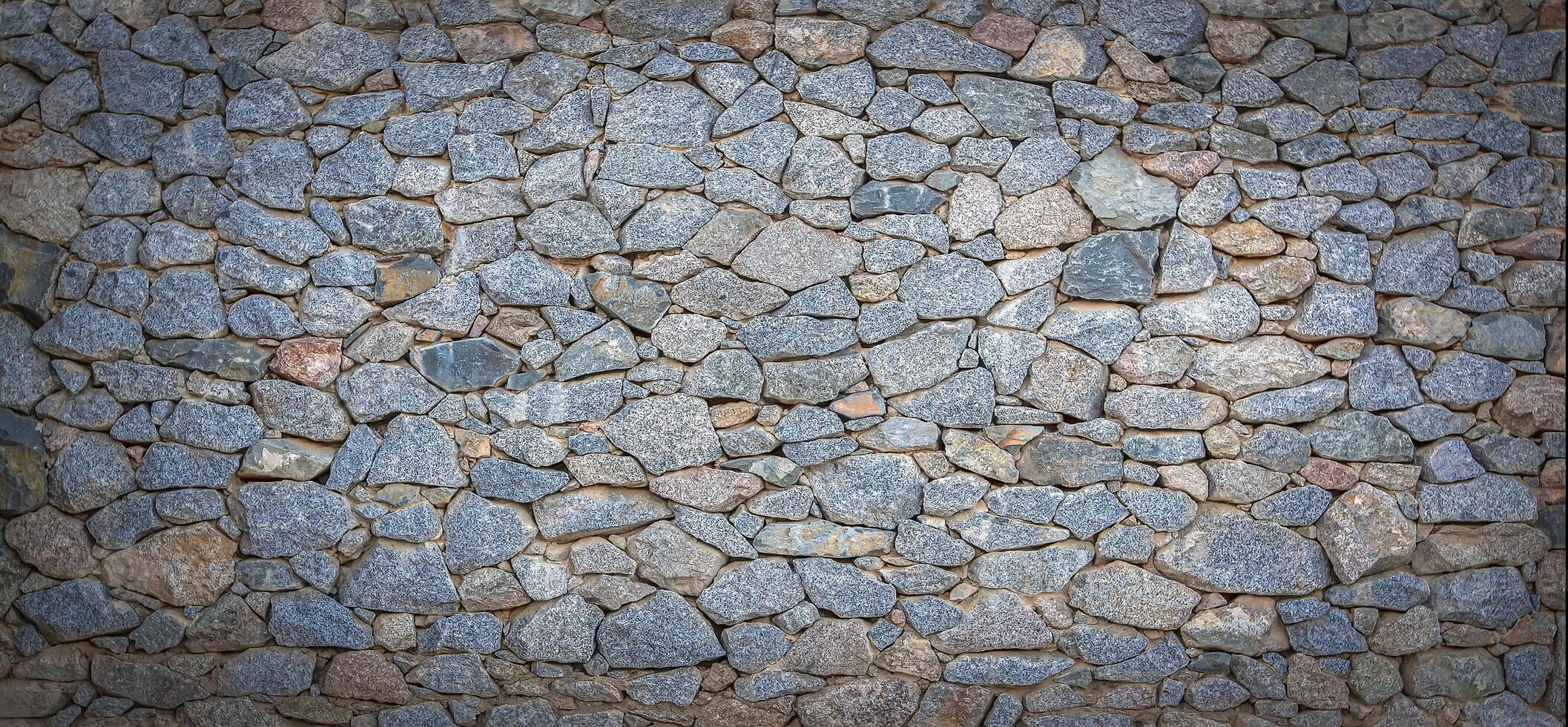 textura de un Roca pared. antiguo castillo Roca pared textura antecedentes. Roca pared como un antecedentes o textura. foto