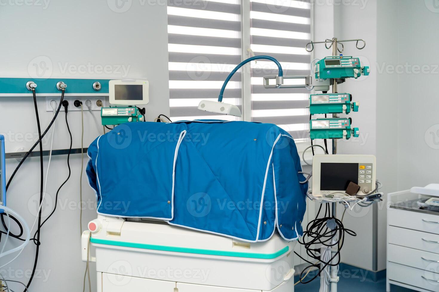 New surgical equipment in clinic. Modern medicine device treats patient health. photo