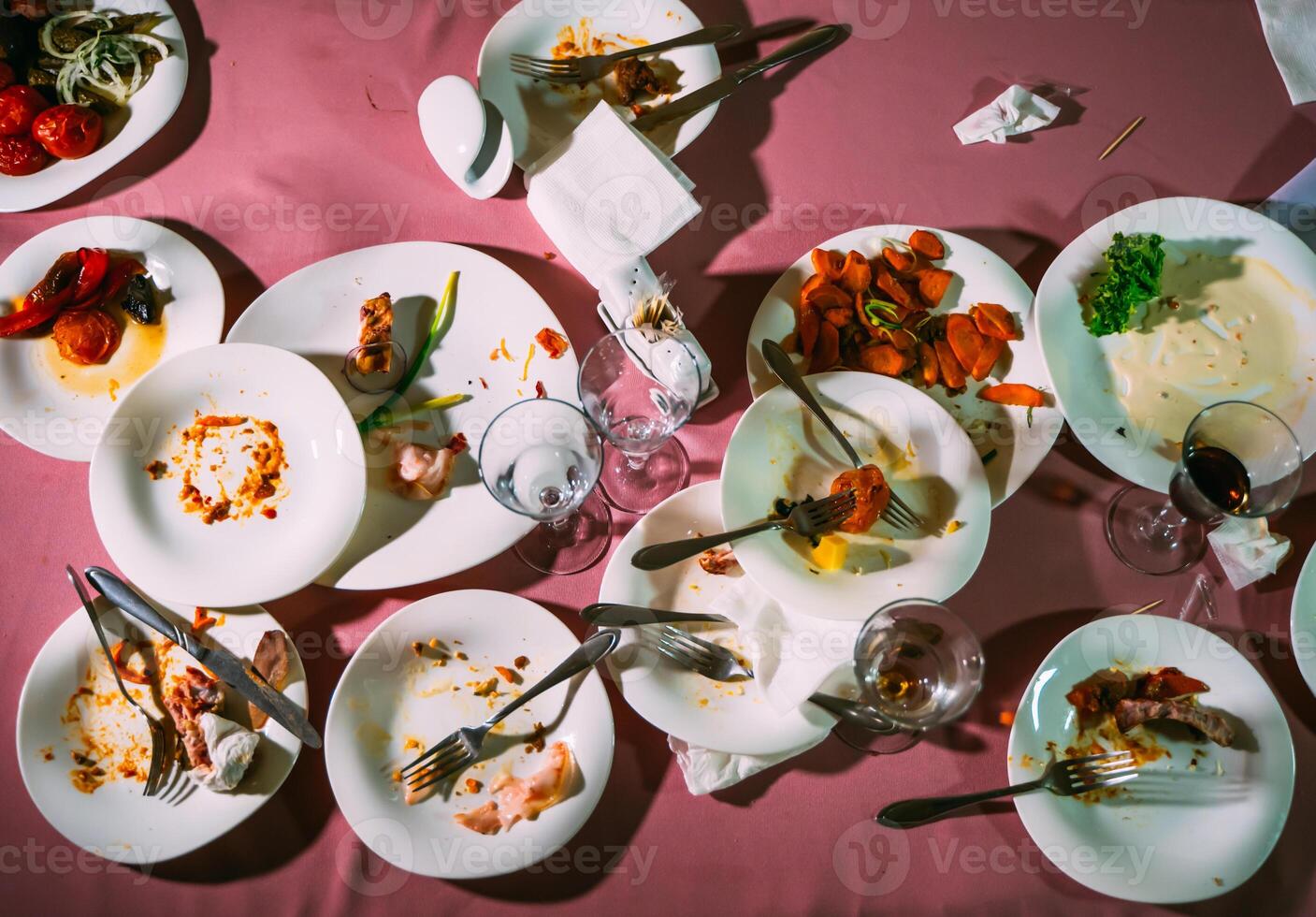 Dirty dishes on a table in a restaurant. After eating photo