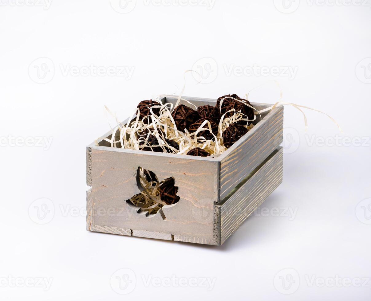 Home decoration in wooden crate on white background photo