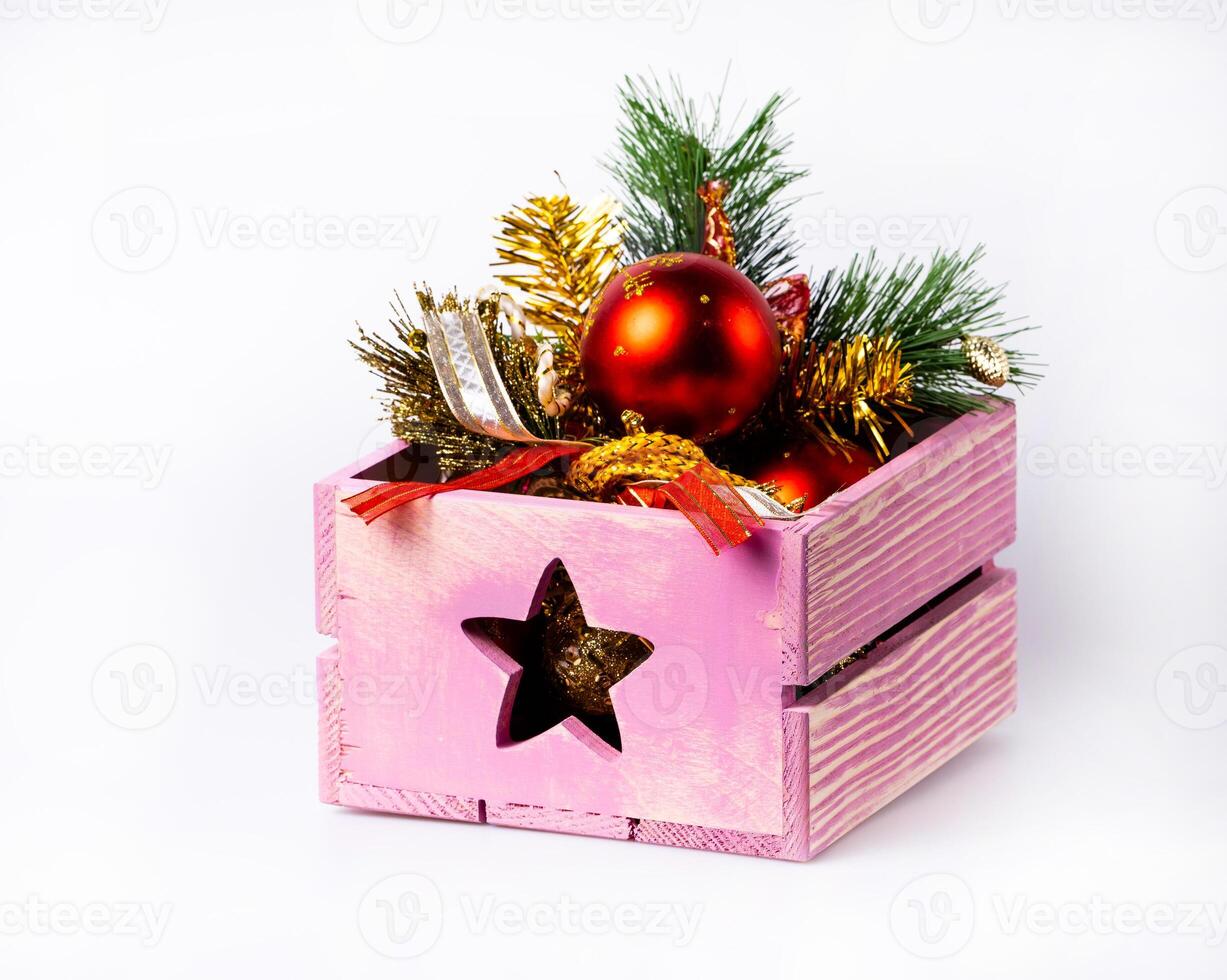 Box with Christmas decorations. Home decoration for New Year photo