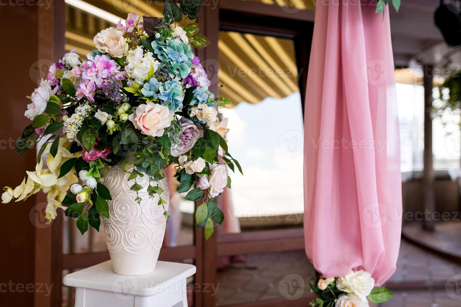 Beautiful wedding decorations for the ceremony outside in sunny weather photo