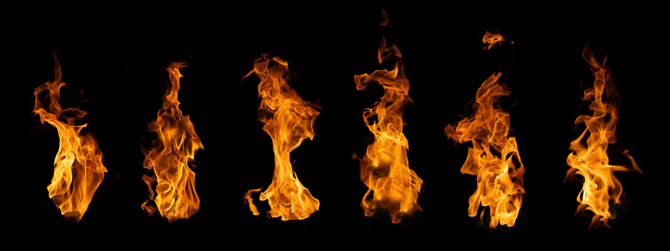 The set of fire and burning flame isolated on dark background for graphic design photo