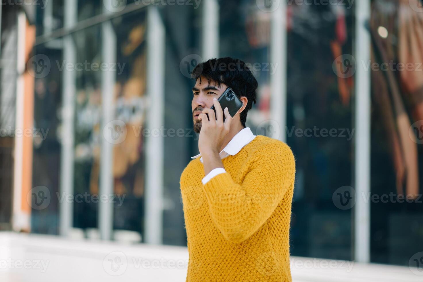 Business Asian man in the office with copy space hand holding laptop, smartphone and tablet portable photo