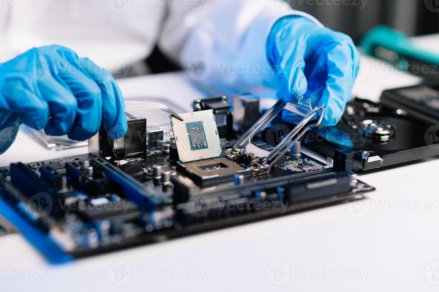 The technician repairing the motherboard in the lab with copy space. the concept of computer hardware, mobile phone, electronic, repairing, upgrade photo