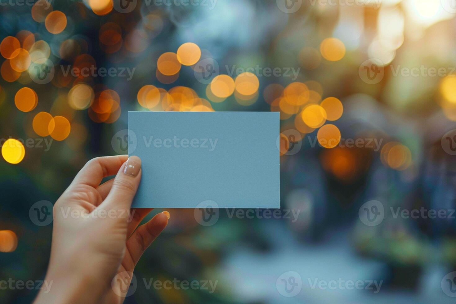 AI generated Womans hand holds small blank blue paper with bokeh background photo