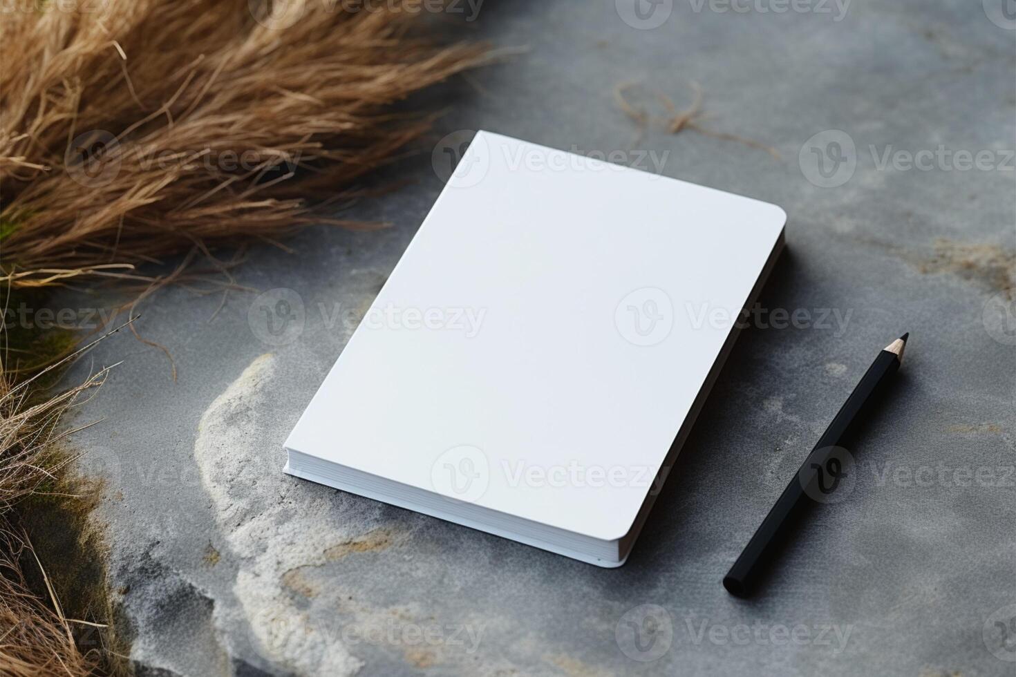 AI generated Minimalist elegance White notebook resting on a gray concrete surface photo