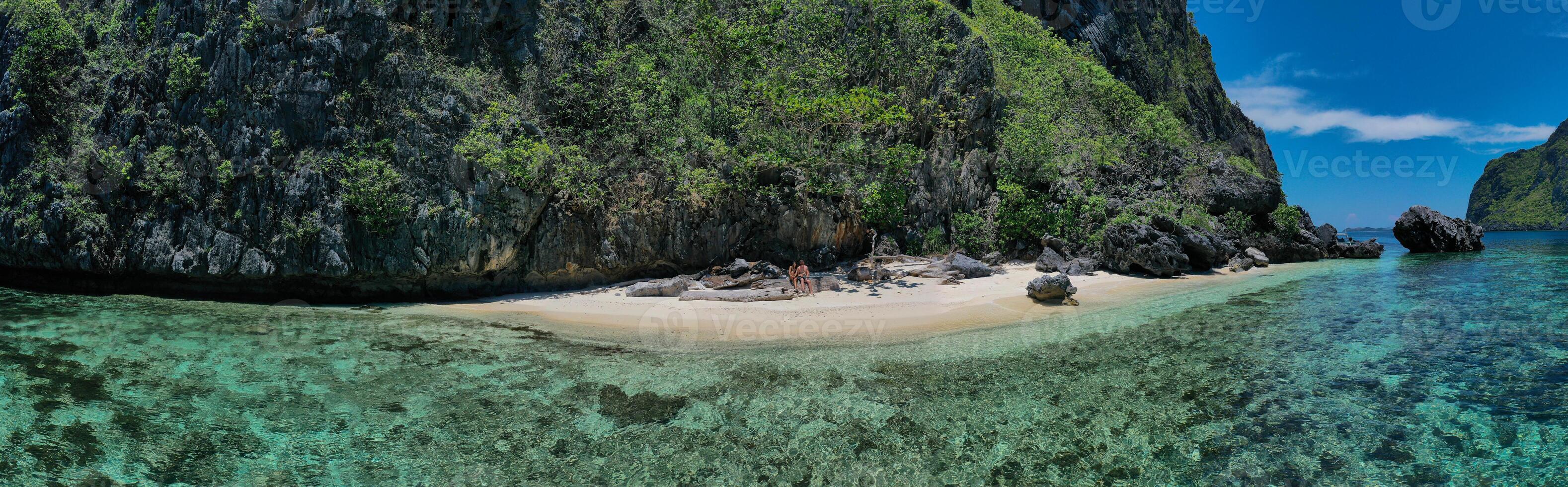 Couple enjoying a tropical beach. photo