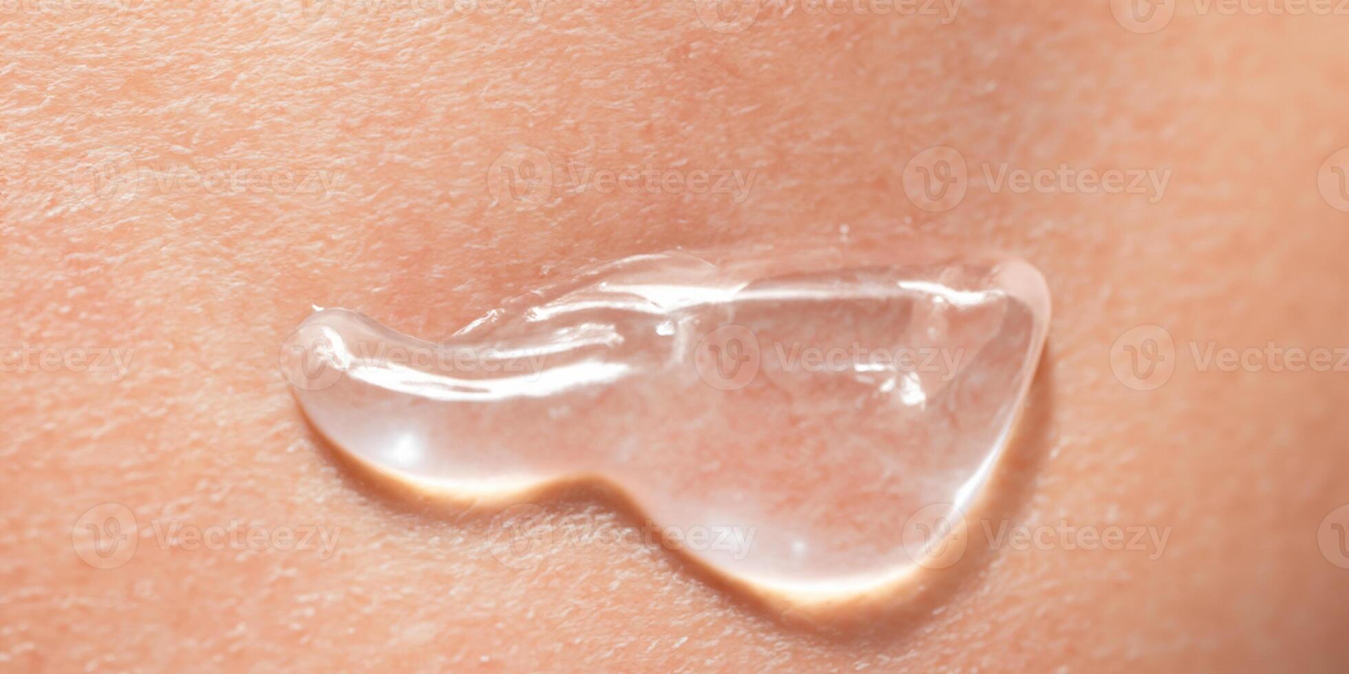 Collagen And Hyaluron Serum Gel On Skin. Splashing of Hyaluron gel. photo