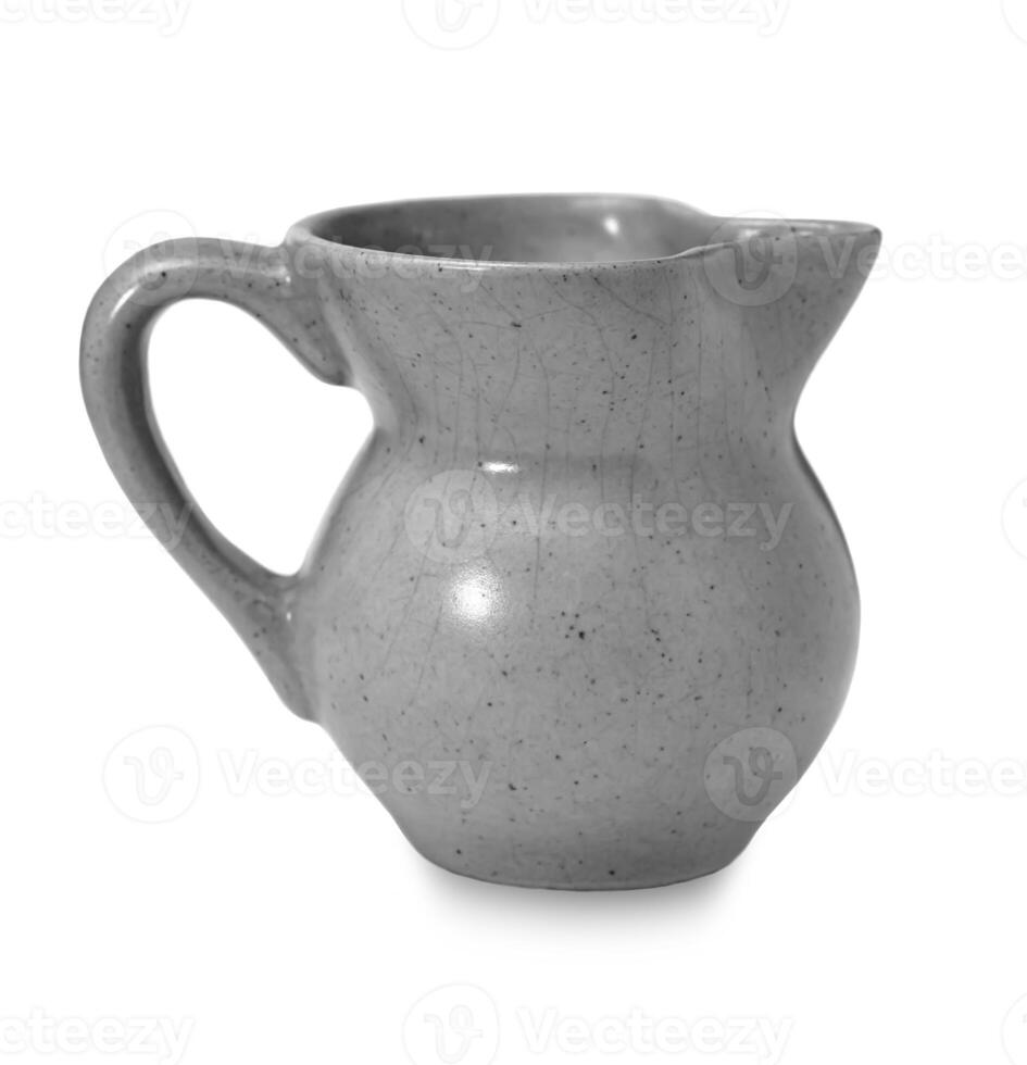 earthenware jug isolated on white background photo