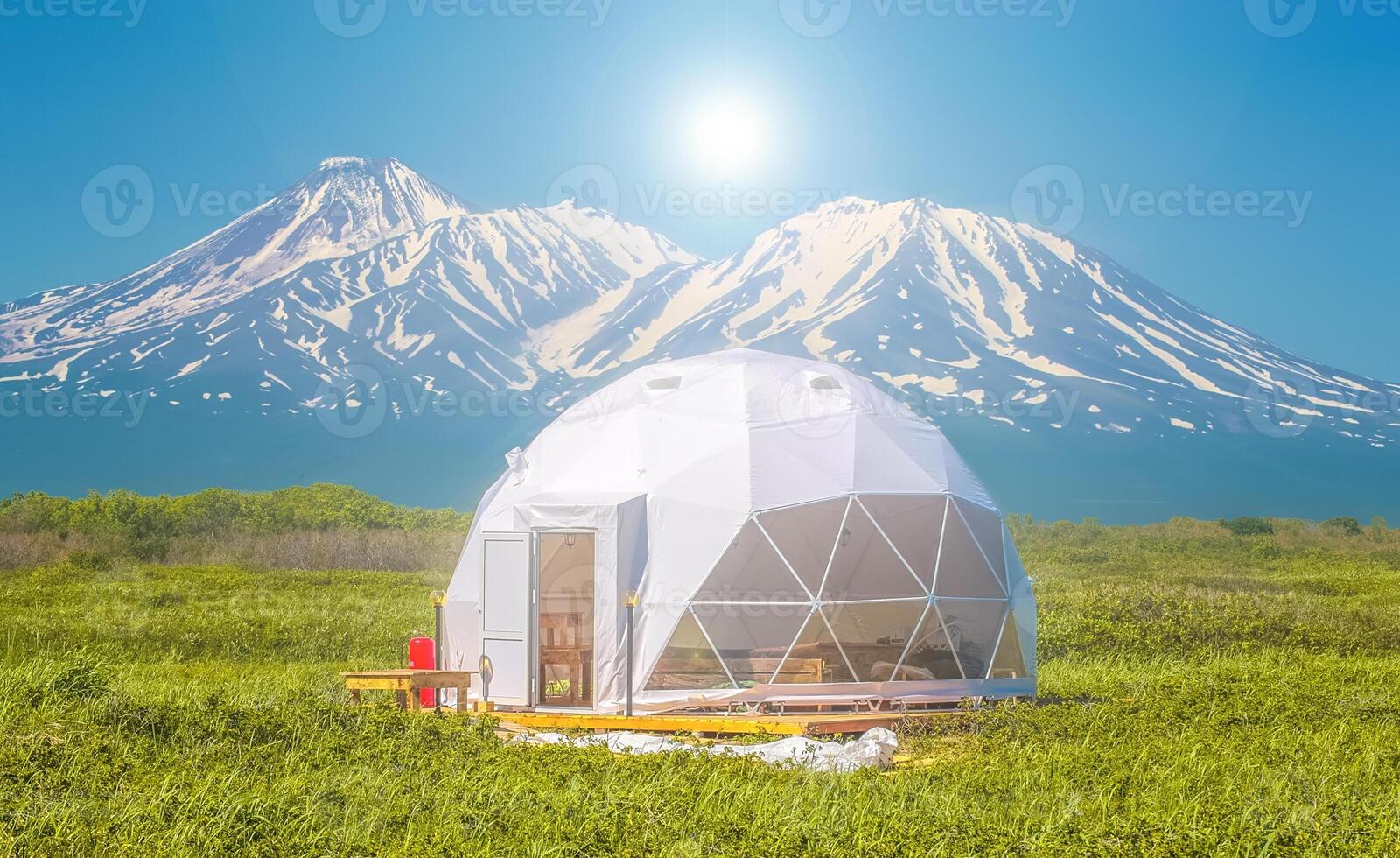 Glamping on the slope of a volcano in autumn on the Kamchatka Peninsula photo