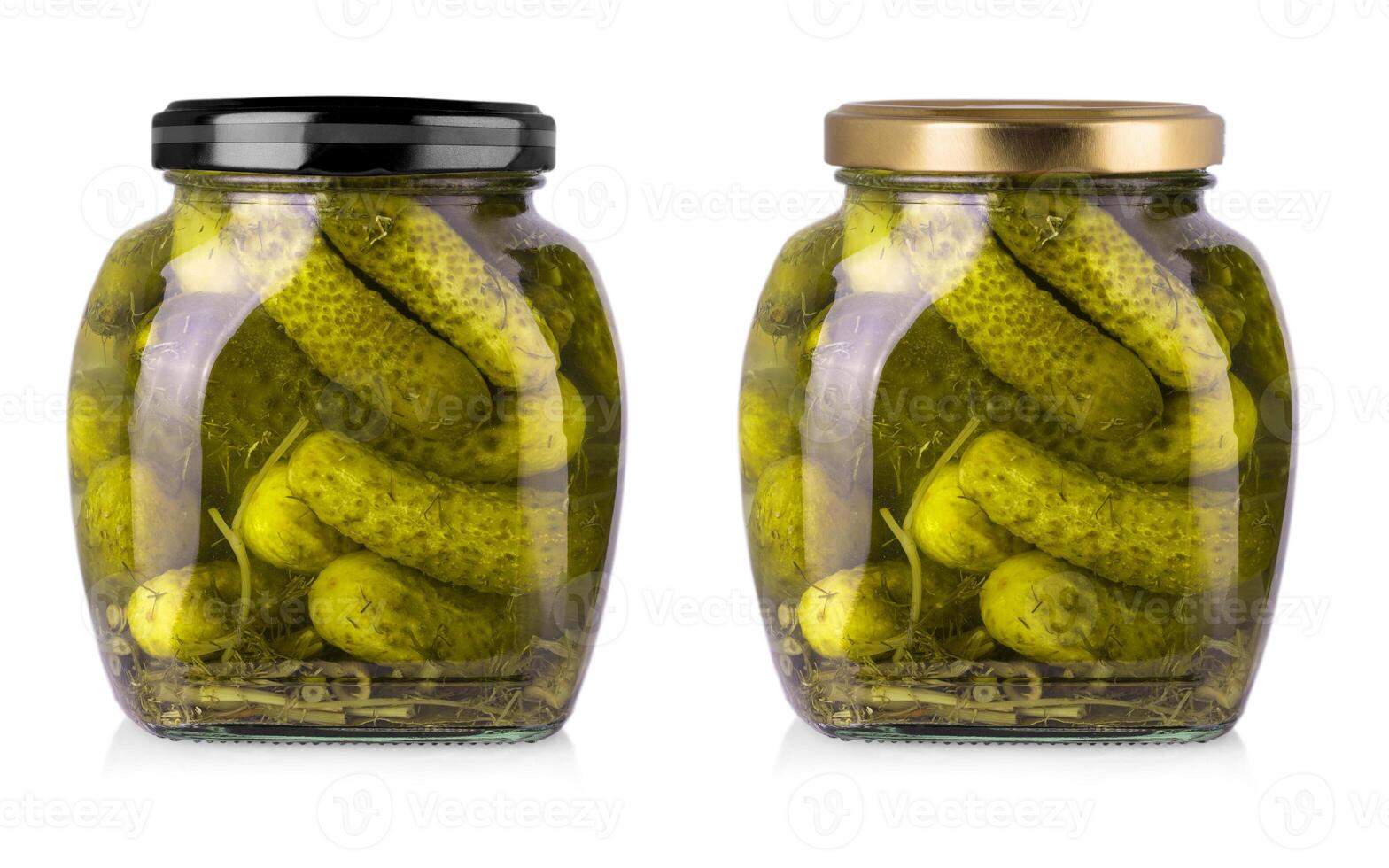 Set of Pickled cucumbers in glass jars on a white background with clipping path photo
