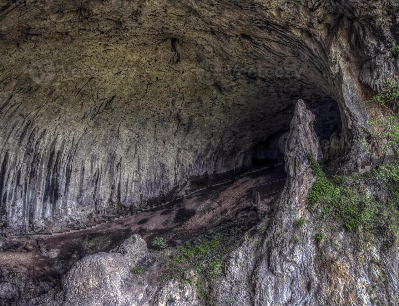 Entrance to the cave of Potpece in Serbia photo