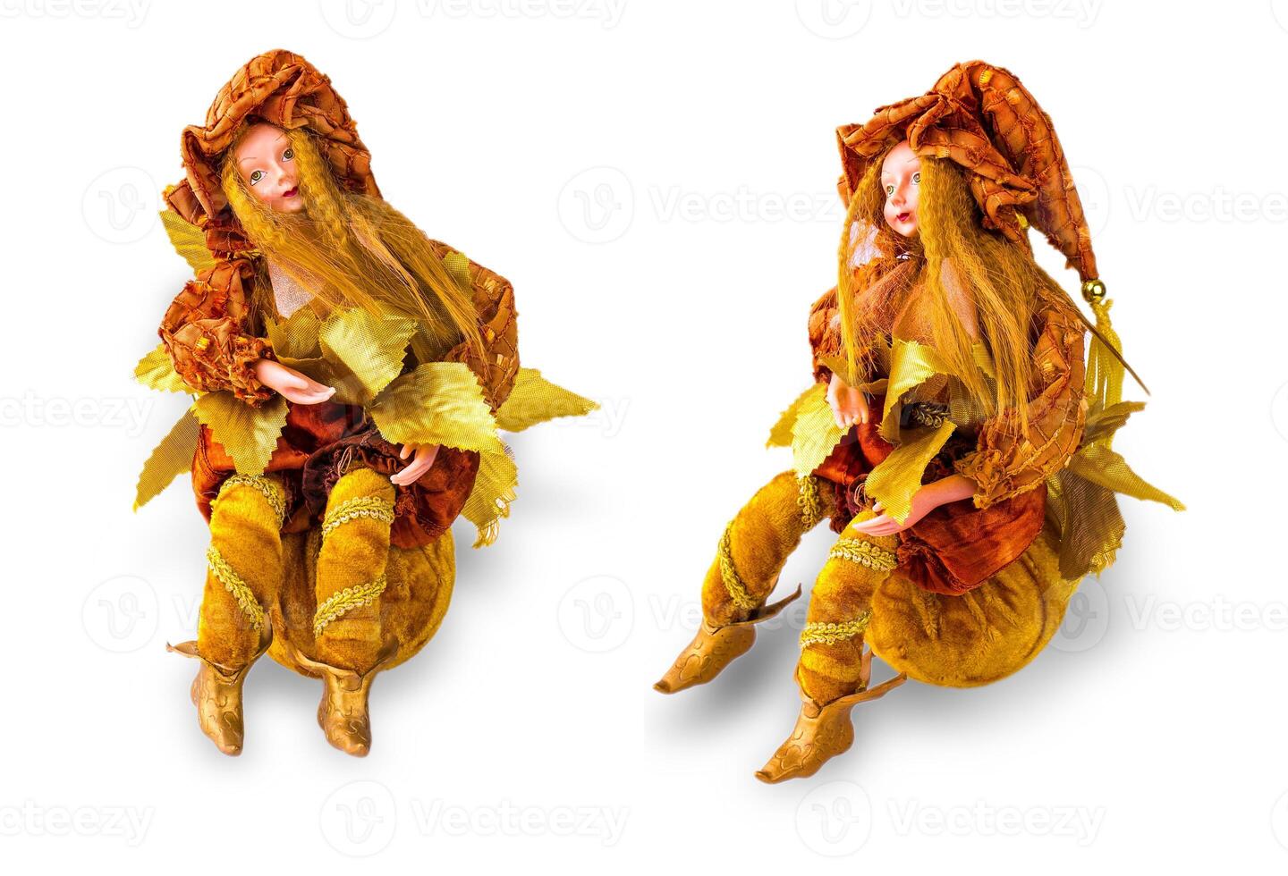 set of dolls with autumn leaves sitting on a ball isolated on white photo