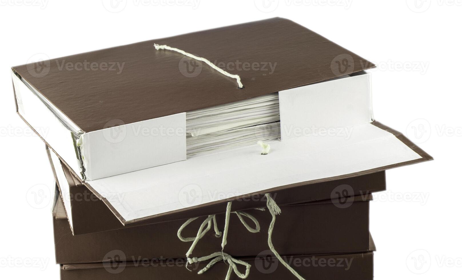 Paper documents stacked in archive isolated on white background with clipping path photo