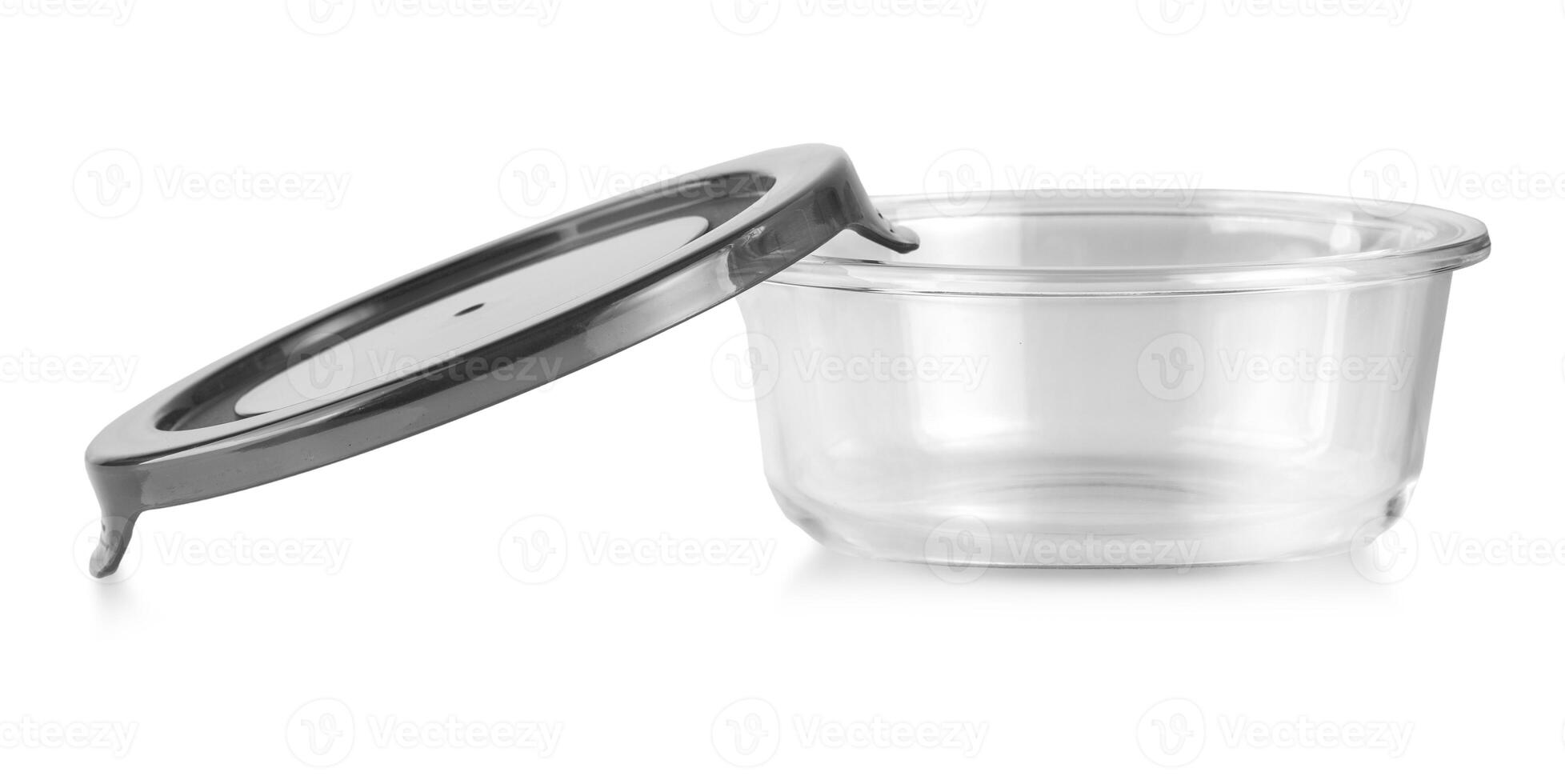 Glass food container with green plastic lid isolated on white photo