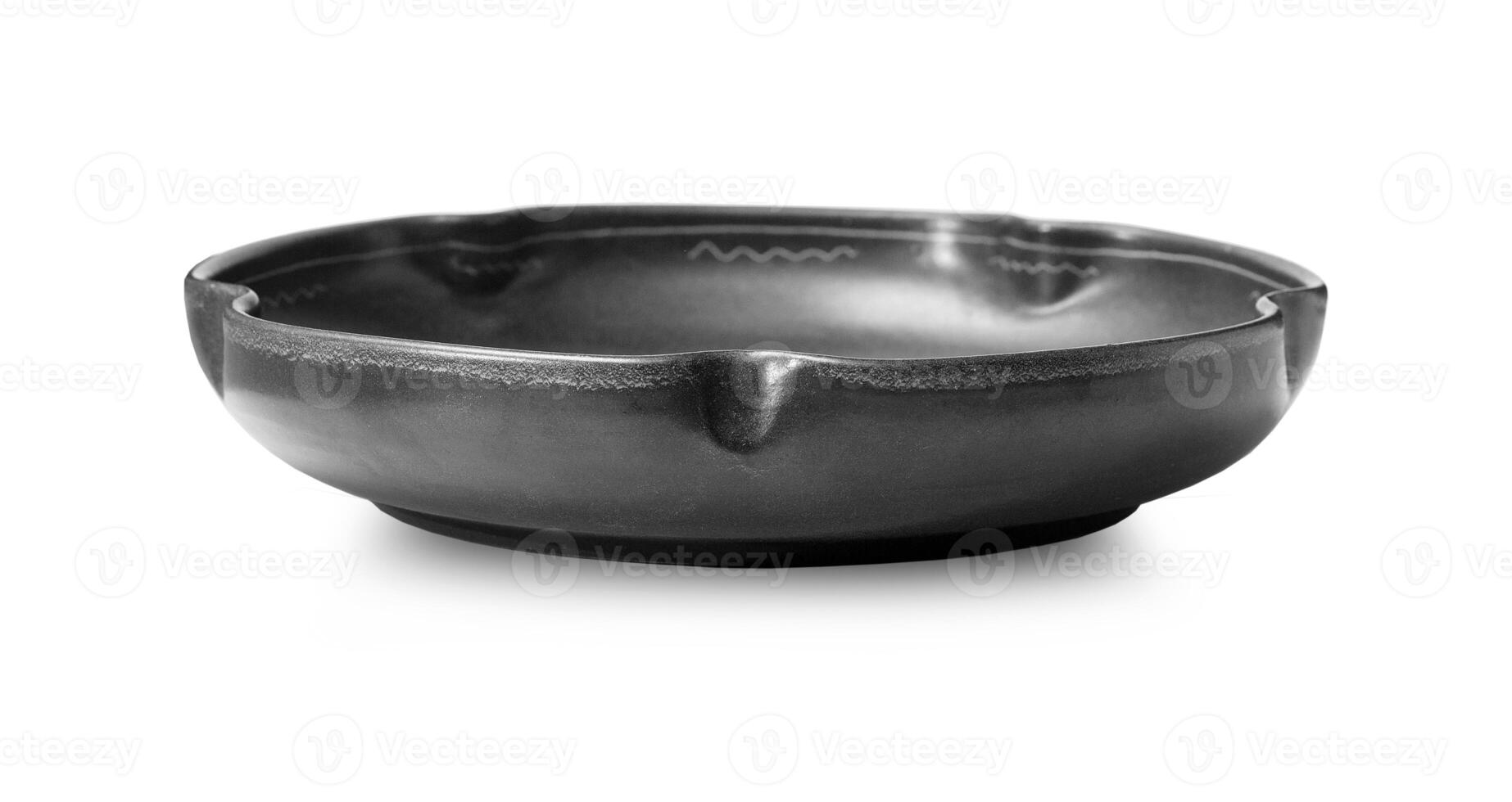 Ancient clay plate isolated on a white background photo