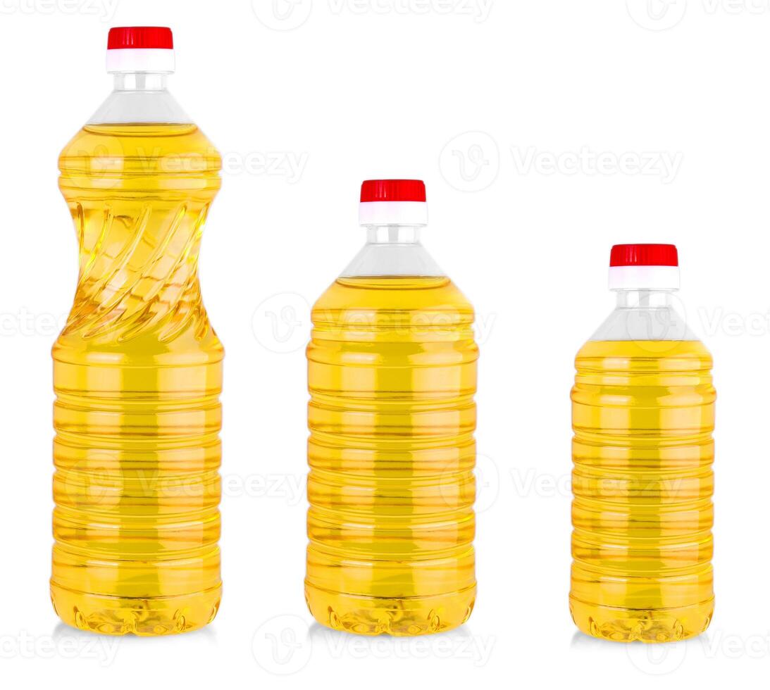 Set of vegetable or sunflower oil in plastic bottles isolated with clipping path photo