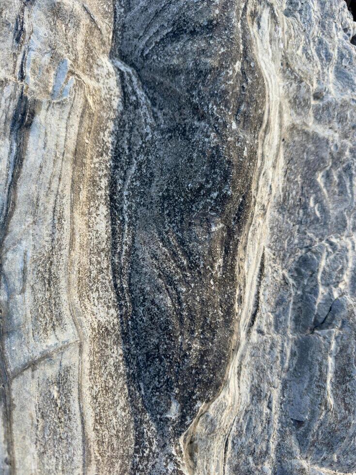 Light white rock texture. Mountain rough surface photo