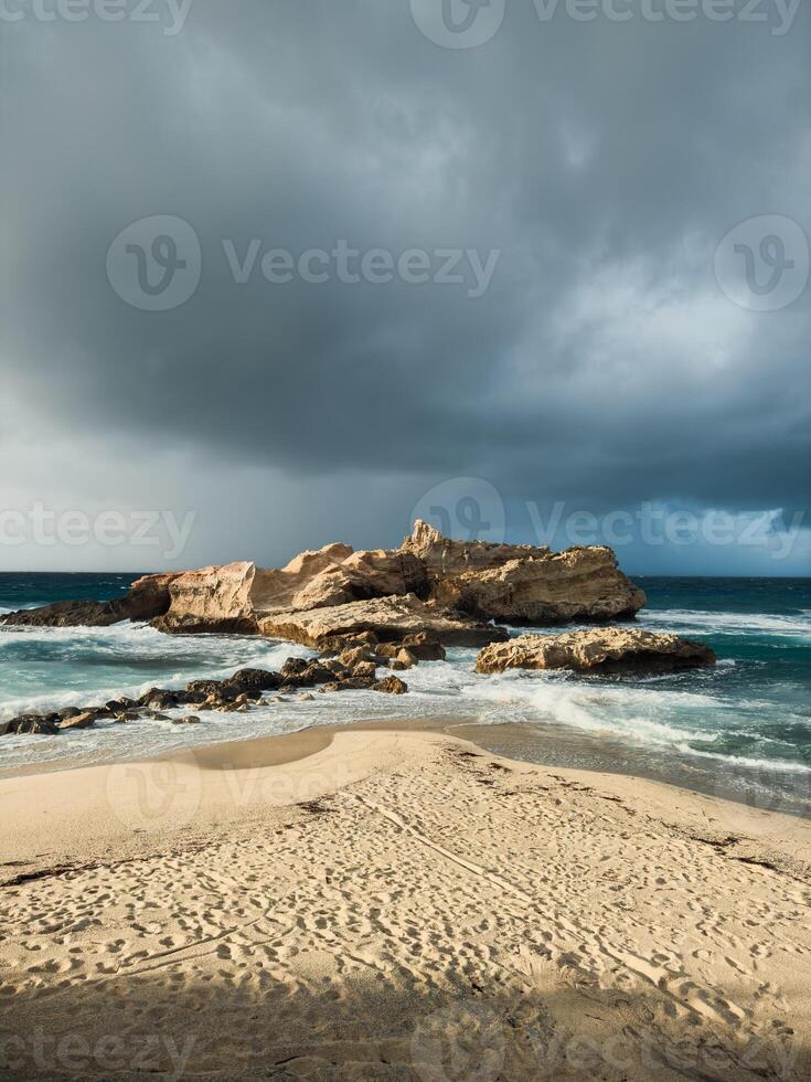 beach with stormy sea in winter photo