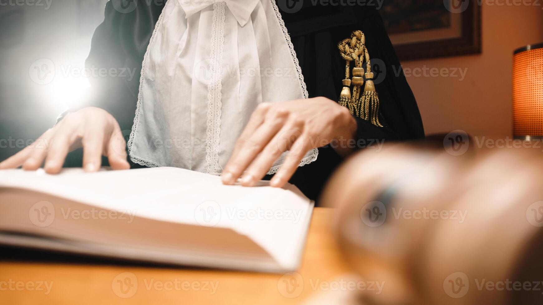 Judge Skims Through A Book photo