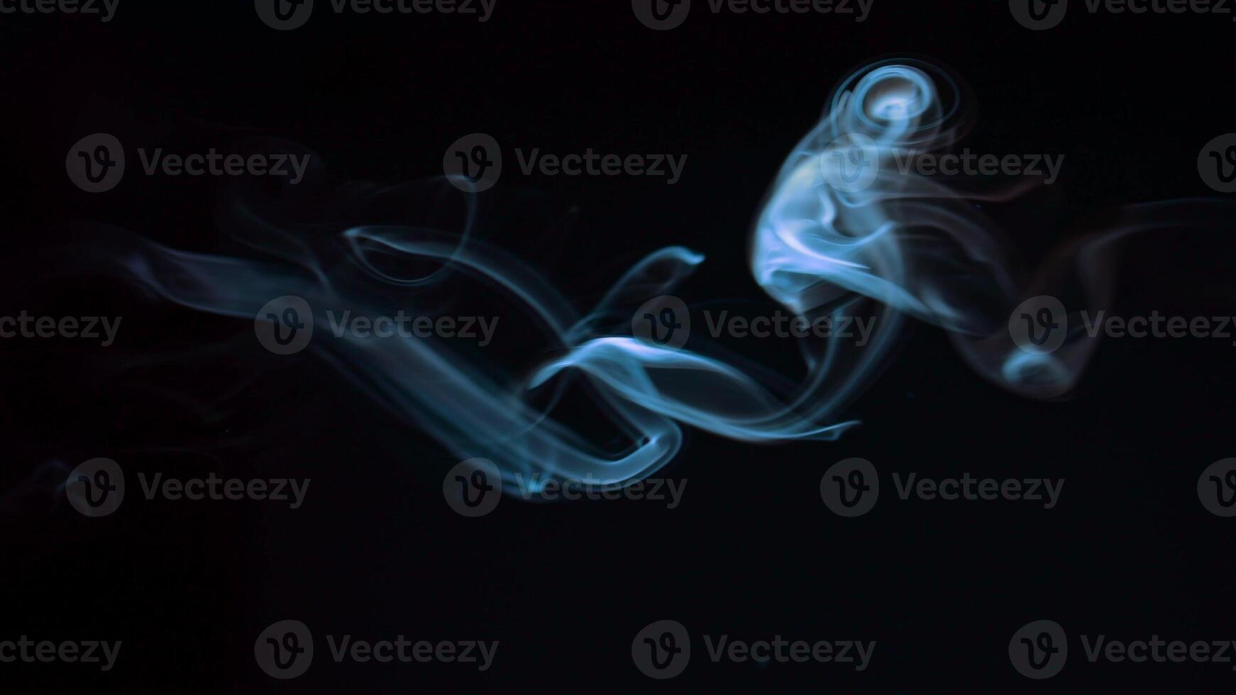 blue smoke, vapor , fog cloud on black background for using in composition and overlay photo