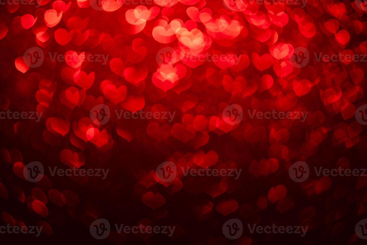 red background with heart-shaped highlights. Beautiful holiday background, background for postcards photo
