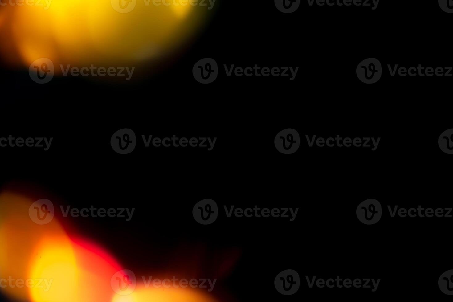 Multicolored highlights on a black background. for overlay to create a festive, vibrant effect photo