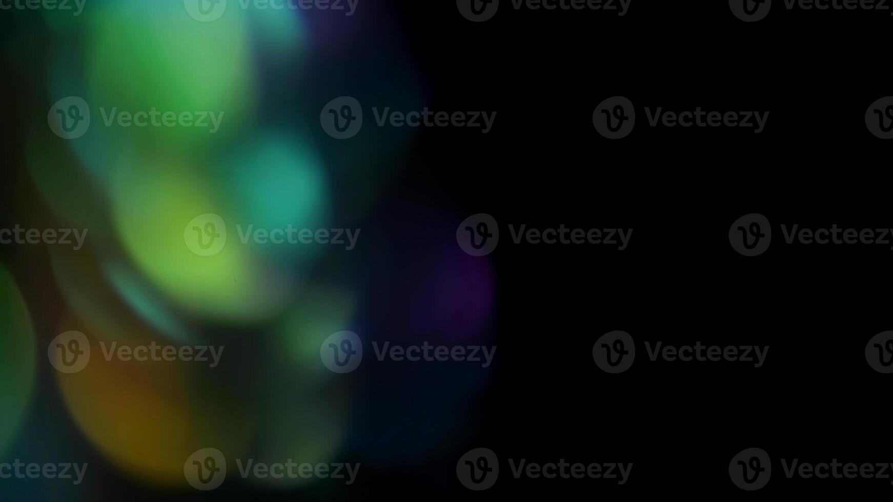 Multicolored highlights on a black background. for overlay to create a festive, vibrant effect photo