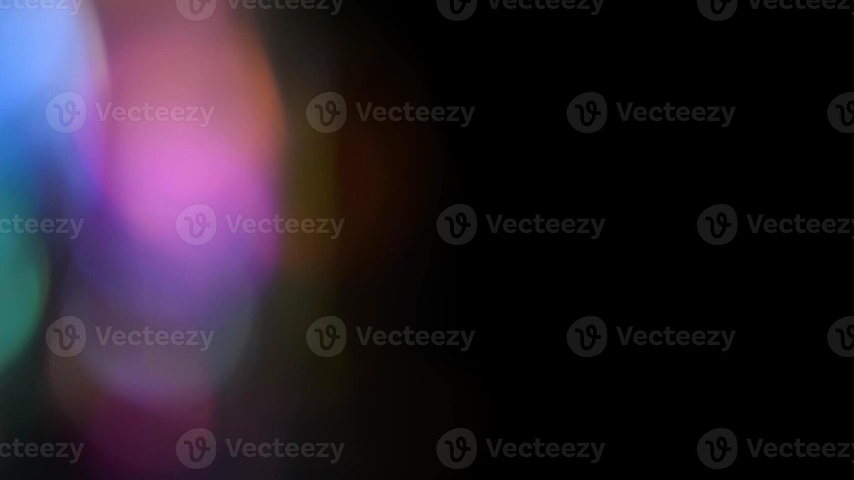 Multicolored highlights on a black background. for overlay to create a festive, vibrant effect photo