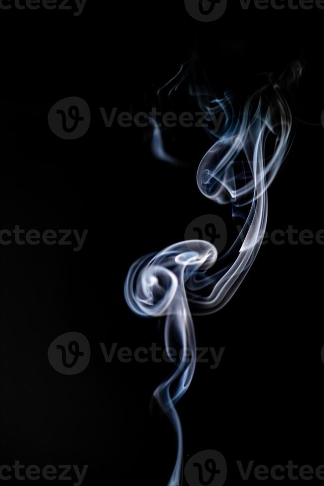 blue smoke, vapor, fog cloud on black background for using in composition and overlay photo