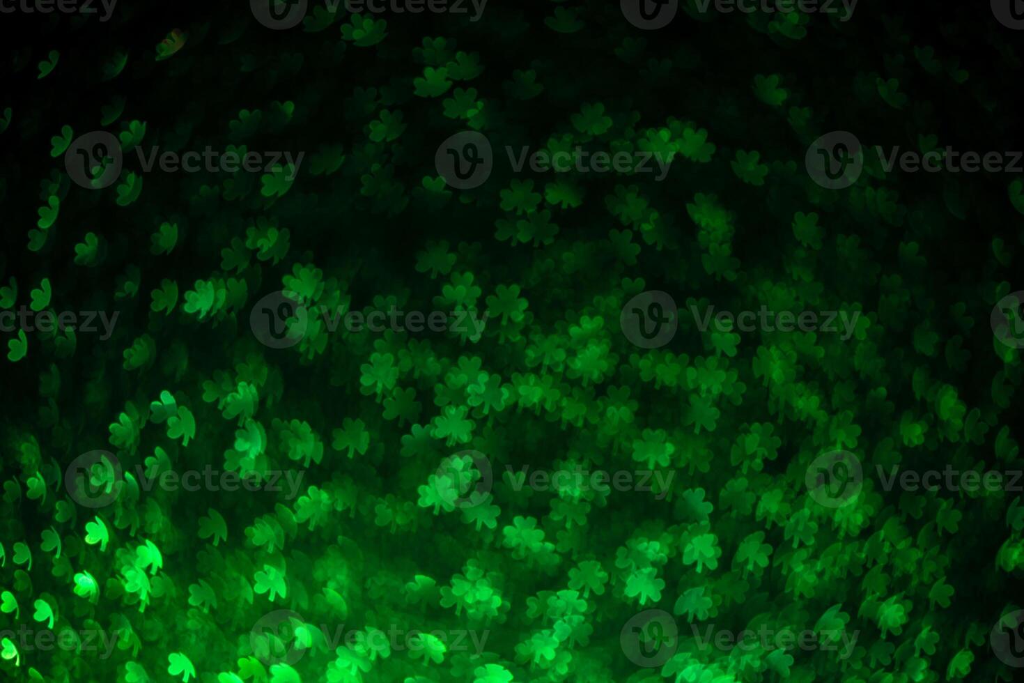 Abstract green background with clover highlights. Spring, summer background, st. Patricks day photo