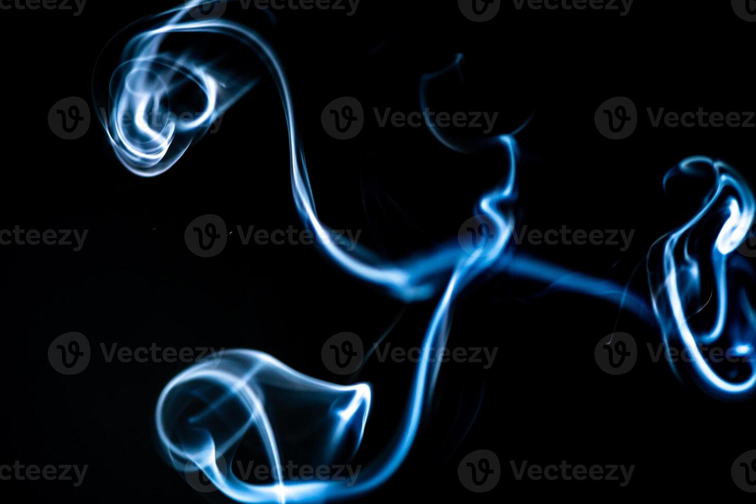 blue smoke, vapor, fog cloud on black background for using in composition and overlay photo