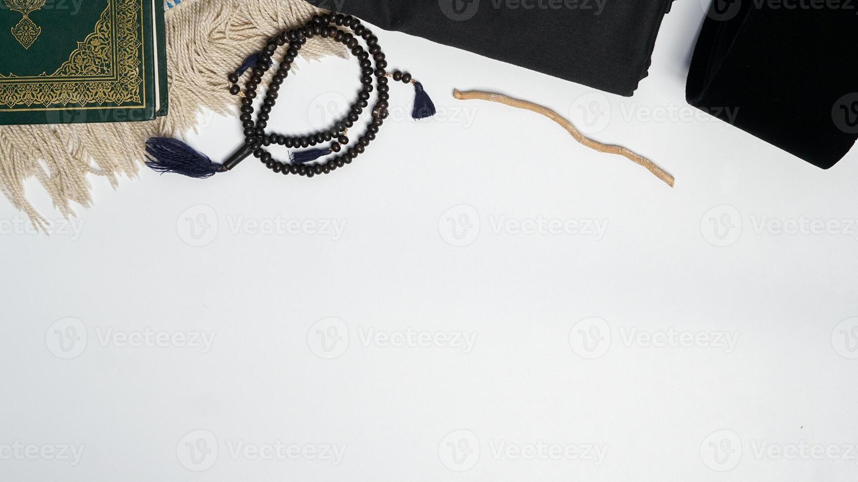 Islamic background with Copy Space, with Muslim prayer equipment on white background photo